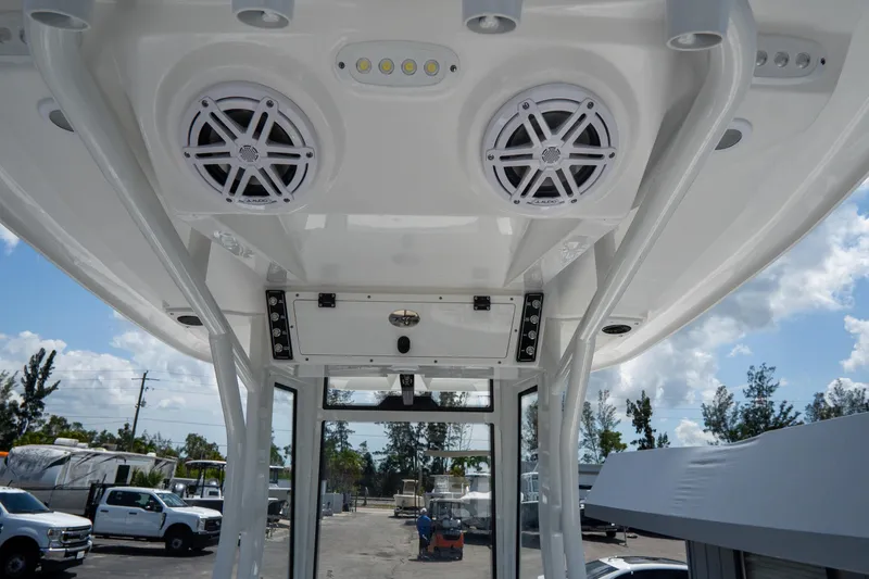 Slide: The Image of 2026 Tidewater 2410 Bay Max boat interior with speakers and control panel. - 14