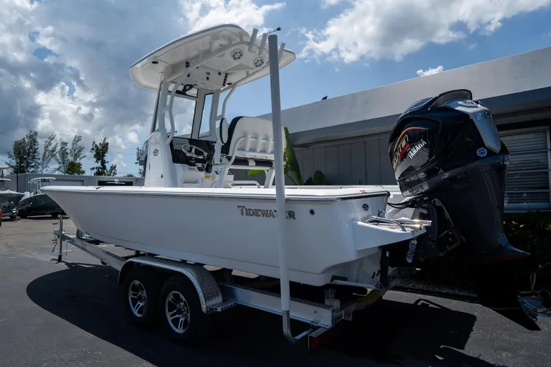 Slide: The Image of 2026 Tidewater 2410 Bay Max boat on trailer with Yamaha outboard motor. - 2