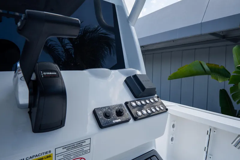 Slide: The Image of Control panel of 2026 Tidewater 2410 Bay Max boat with Yamaha throttle. - 23