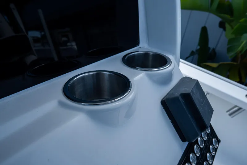 Slide: The Image of Cup holders on a 2026 Tidewater 2410 Bay Max boat console. - 24