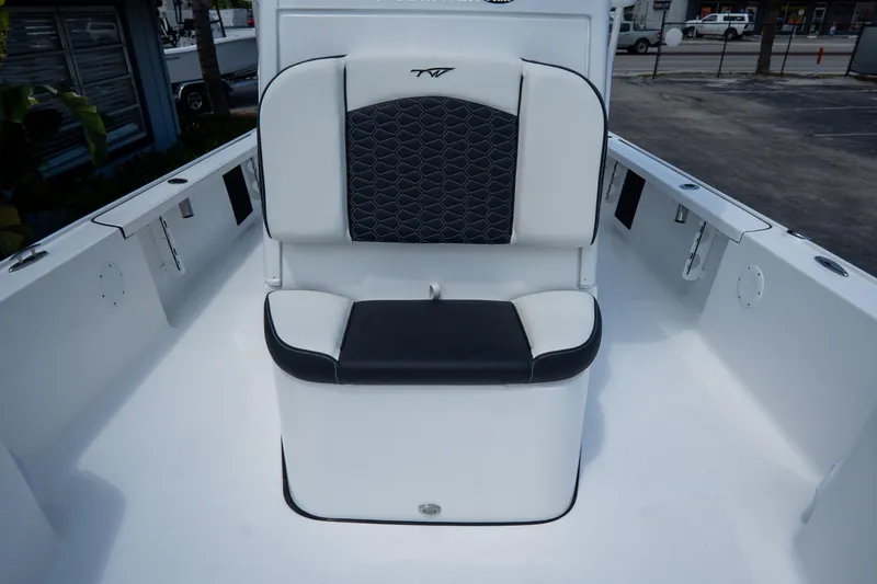 Slide: The Image of 2026 Tidewater 2410 Bay Max boat seat with black and white upholstery. - 39