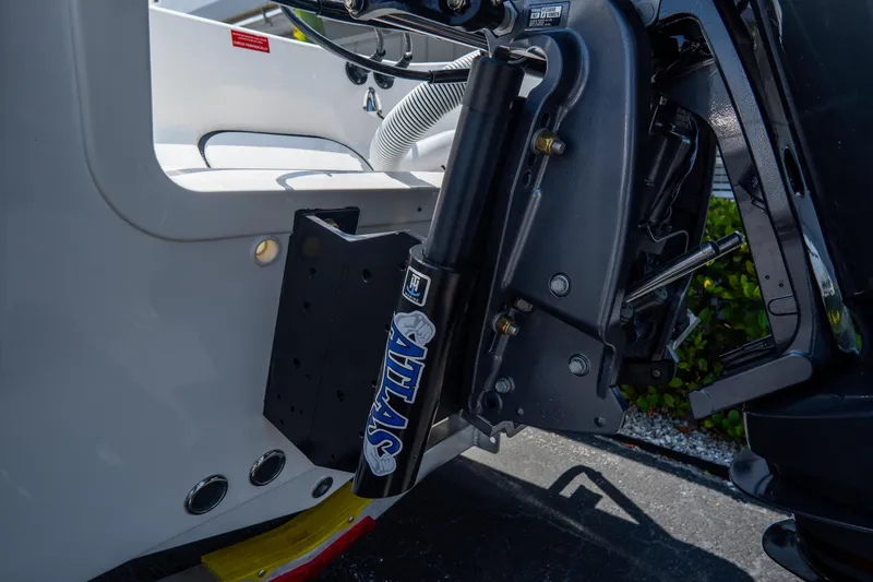Slide: The Image of Close-up of 2026 Tidewater 2410 Bay Max boat engine mount and hydraulic system. - 4