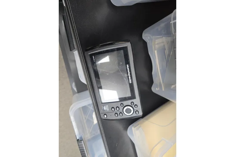 Slide: The Image of Humminbird Helix 5 fish finder on a 2017 Xpress H20B Bay boat. - 16