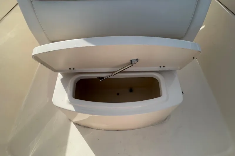 Slide: The Image of Open storage compartment on 2021 Grady-White Canyon 271 boat. - 20