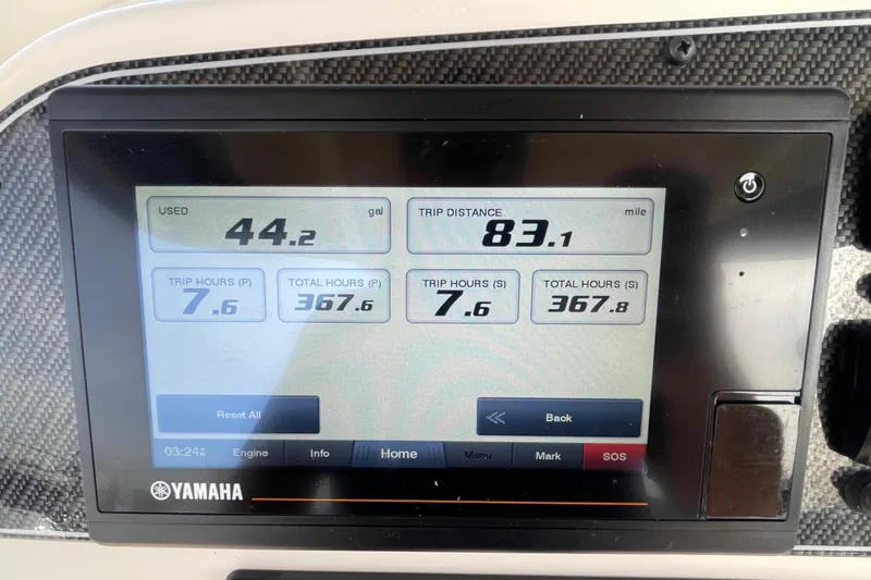 Slide: The Image of Yamaha display showing fuel usage and trip data on 2021 Grady-White Canyon 271 boat. - 28