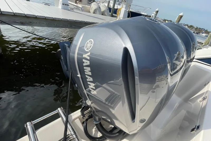 Slide: The Image of 2021 Grady-White Canyon 271 with Yamaha outboard engines at a dock. - 46