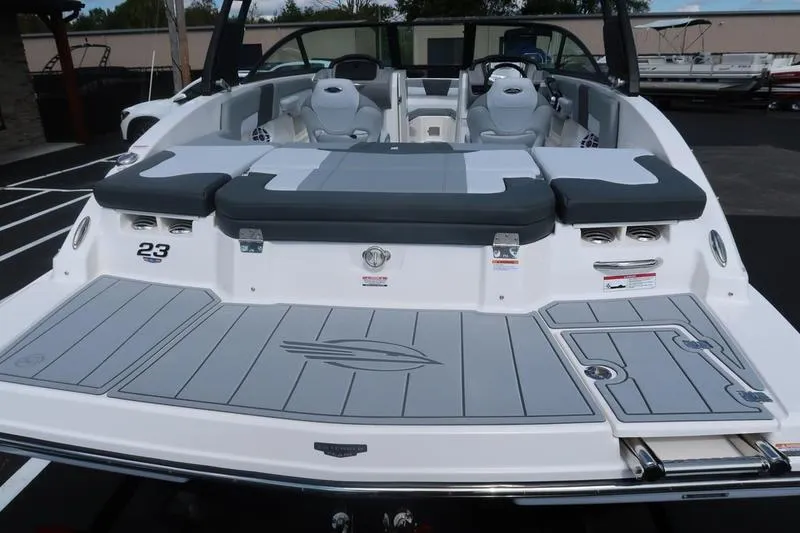 Slide: The Image of Rear view of 2026 Chaparral 23 SSi boat with propeller and swim platform. - 11