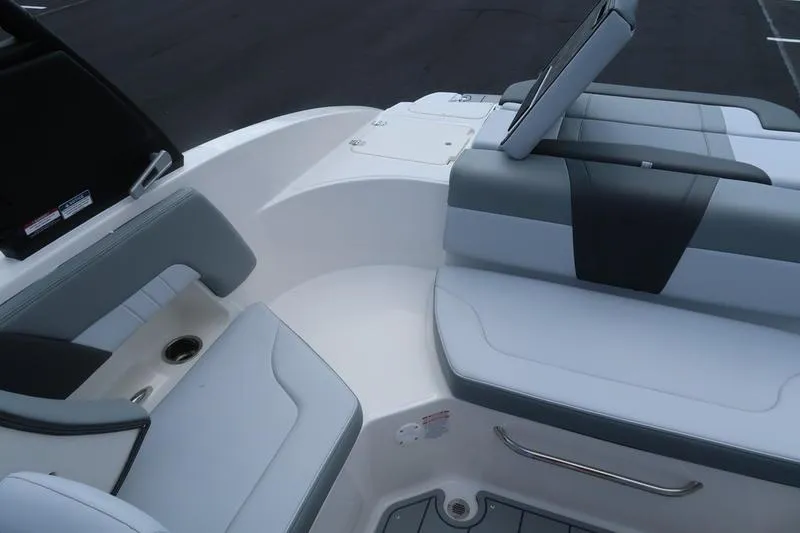 Slide: The Image of 2026 Chaparral 23 SSi boat cleat on textured deck under blue sky. - 17