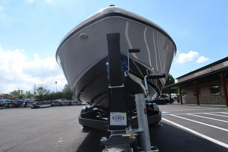 Slide: The Image of 2026 Chaparral 23 SSi boat interior with gray seating and sleek design. - 24