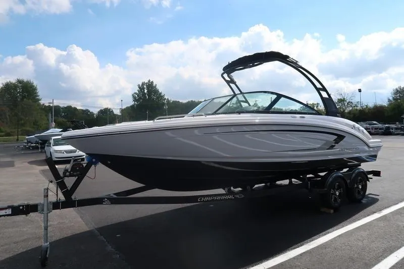 Slide: The Image of 2026 Chaparral 23 SSi boat seating area with modern gray upholstery design. - 26