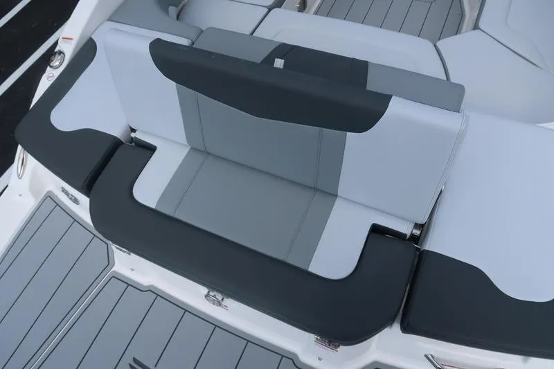 Slide: The Image of Bow storage compartment of 2026 Chaparral 23 SSi boat, open lid view. - 28