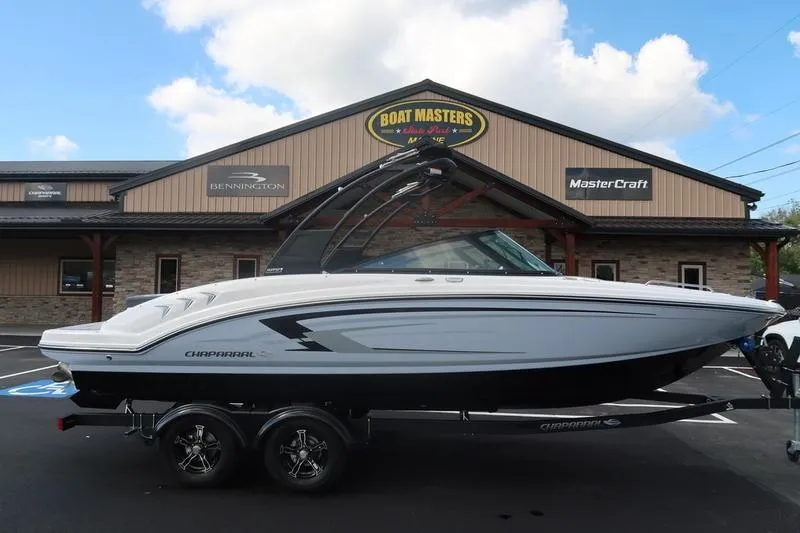 Slide: The Image of 2026 Chaparral 23 SSi boat interior with sleek seating and modern dashboard design. - 30