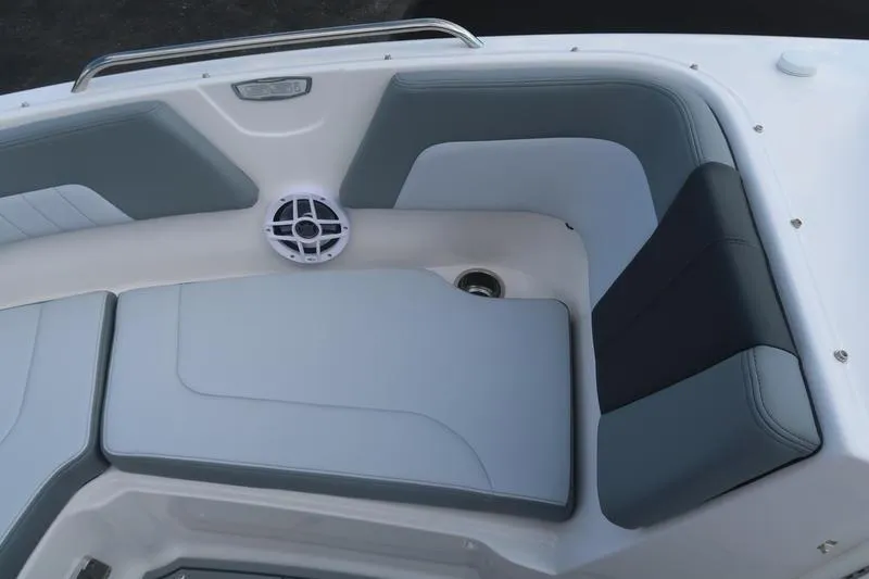 Slide: The Image of Chaparral 23 SSi 2026 logo on gray leather upholstery. - 37