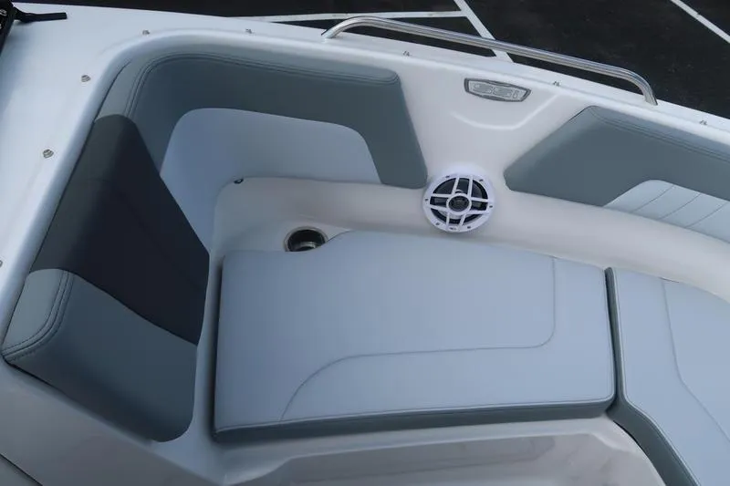 Slide: The Image of 2026 Chaparral 23 SSi boat interior with sleek gray flooring and seating. - 39