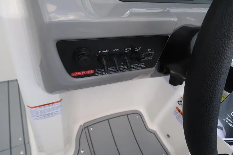 Slide: The Image of 2026 Chaparral 23 SSi capacity label, 13 persons or 1765 lbs, SmartCraft diagnostics. - 48