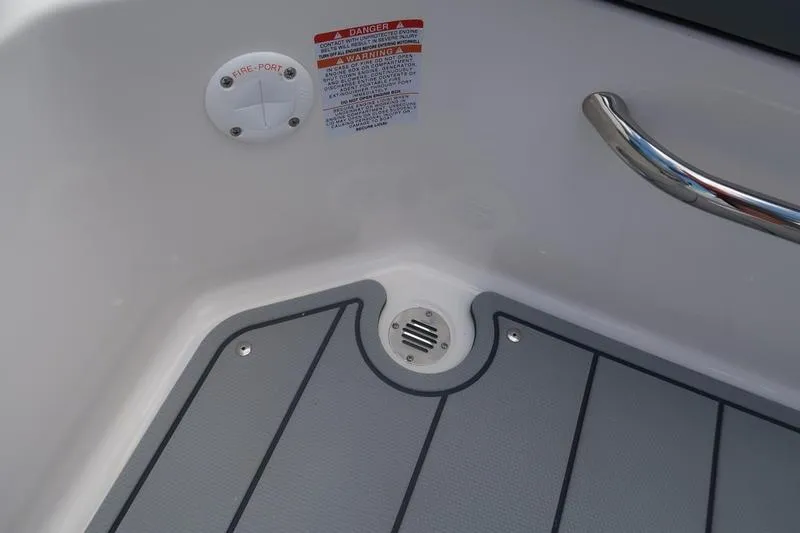 Slide: The Image of 2026 Chaparral 23 SSi boat interior with modern steering and controls. - 53