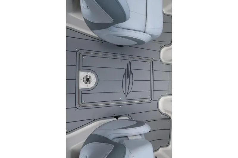 Slide: The Image of Interior view of 2026 Chaparral 23 SSi boat, featuring sleek seating and flooring design. - 56