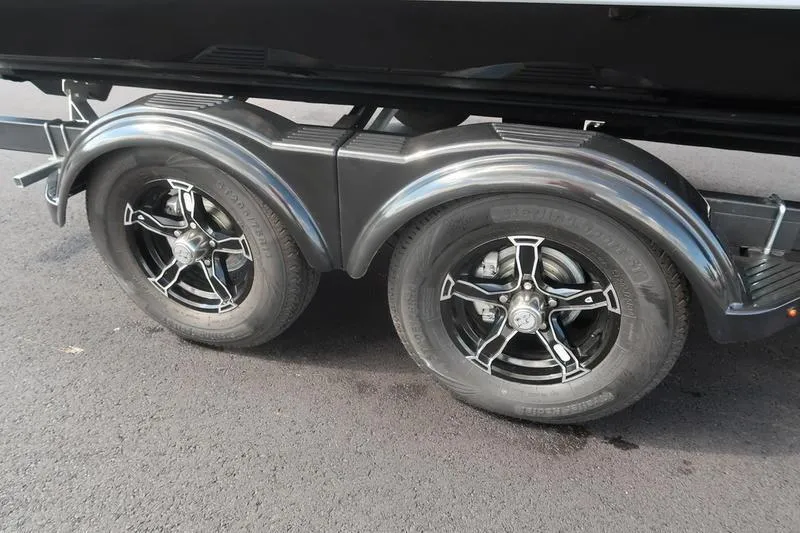 Slide: The Image of 2026 Chaparral 23 SSi boat on trailer, parked outside Boat Masters dealership. - 8