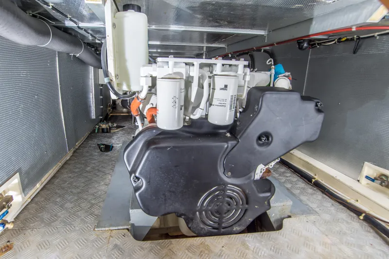 Slide: The Image of Engine room of 2008 North Pacific 43 Pilothouse boat, showcasing machinery and components. - 35