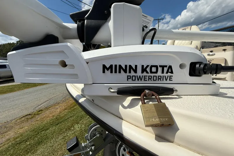 Slide: The Image of Minn Kota PowerDrive on 2020 Carolina Skiff 19 LS boat, secured with a padlock. - 6
