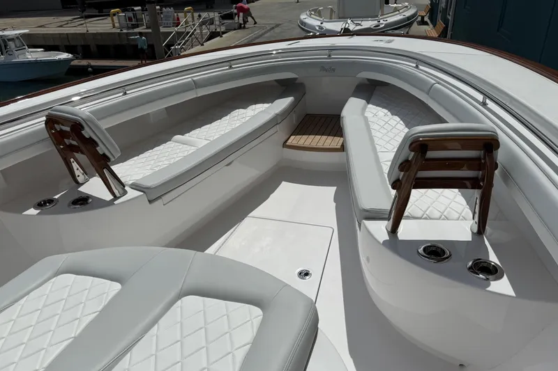 Slide: The Image of Luxurious seating area on 2026 Mag Bay 38 CC boat with elegant design. - 4