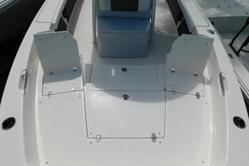 Slide: The Image of 2026 Pathfinder 2400 TRS boat interior with storage compartments and seating. - 30