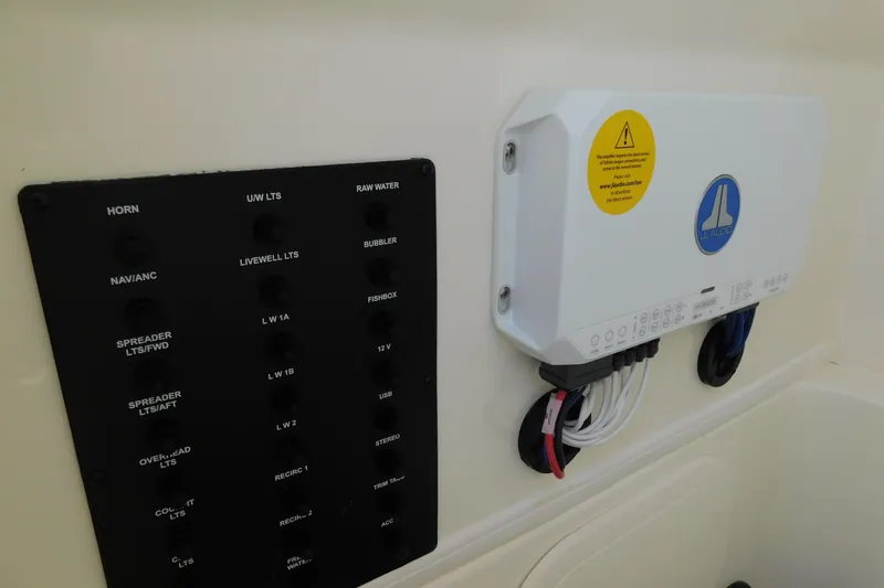 Slide: The Image of Control panel and audio system on 2026 Pathfinder 2400 TRS boat. - 37