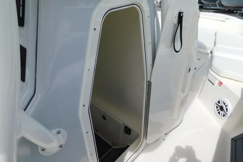 Slide: The Image of Open storage compartment on 2026 Pathfinder 2400 TRS boat, showcasing interior space. - 39