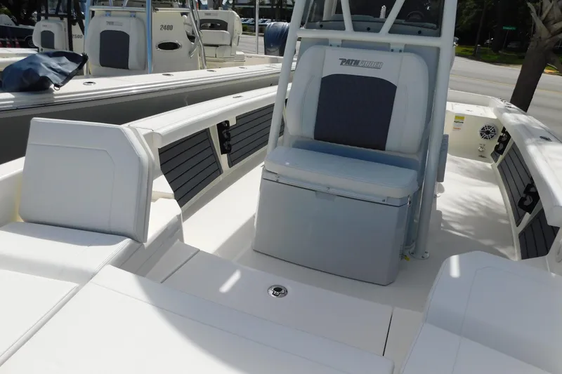 Slide: The Image of 2026 Pathfinder 2400 TRS boat interior with seating and console, showcasing modern design. - 44