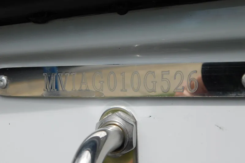Slide: The Image of 2026 Pathfinder 2400 TRS boat hull identification number (HIN) plate close-up. - 45