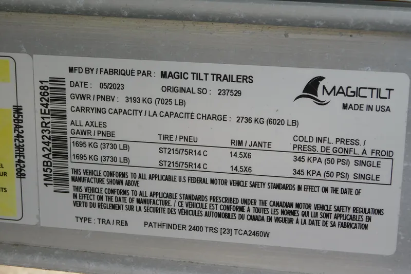 Slide: The Image of Magic Tilt Trailers label with specifications for Pathfinder 2400 TRS, 2026 model. - 48