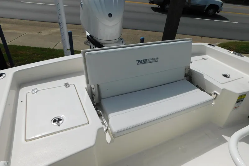 Slide: The Image of 2026 Pathfinder 2400 TRS boat interior with seating and storage compartments. - 7