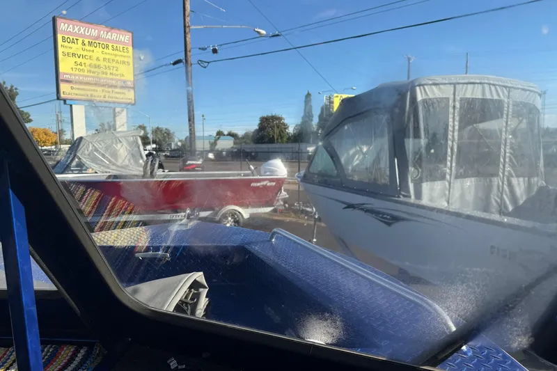 Slide: The Image of 2006 Custom Weld Cobra OB boat at Maxxum Marine sales lot. - 17