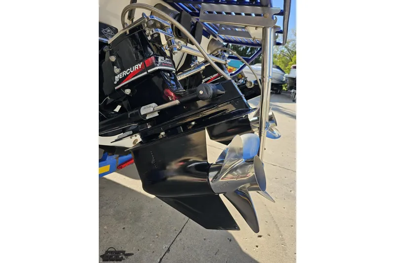 Slide: The Image of Close-up of 2004 Baja 29 Outlaw boat's Mercury outdrive and propeller. - 32
