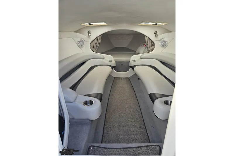 Slide: The Image of Interior of 2004 Baja 29 Outlaw boat with sleek seating and modern design. - 57
