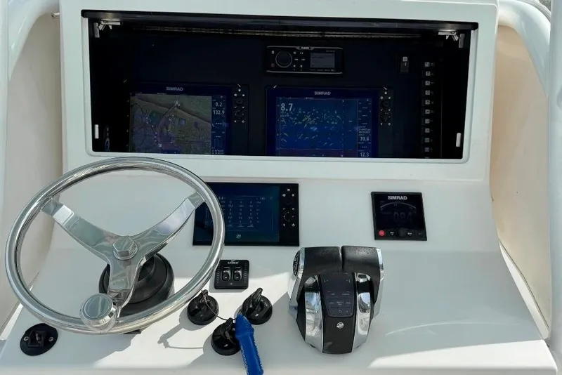 Slide: The Image of 2019 Onslow Bay 33 Tournament boat radio equipment with Icom VHF marine radios. - 31