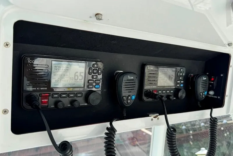 Slide: The Image of 2019 Onslow Bay 33 Tournament boat with Icom marine radios and microphones. - 32