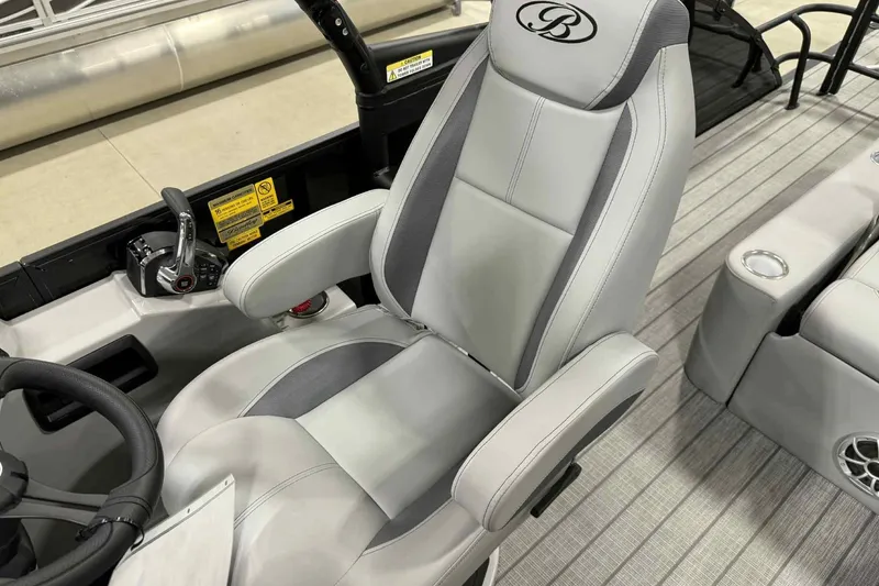 Slide: The Image of Captain's chair in 2026 Bentley Pontoons Legacy 243 Swingback, featuring sleek design and controls. - 14