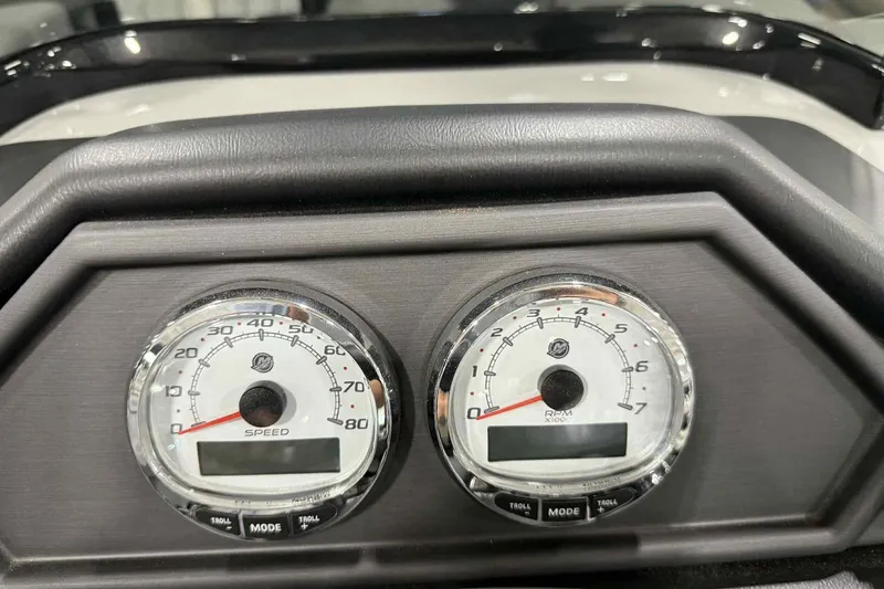 Slide: The Image of Dashboard of 2026 Bentley Pontoons Legacy 243 with speedometer and RPM gauges. - 16