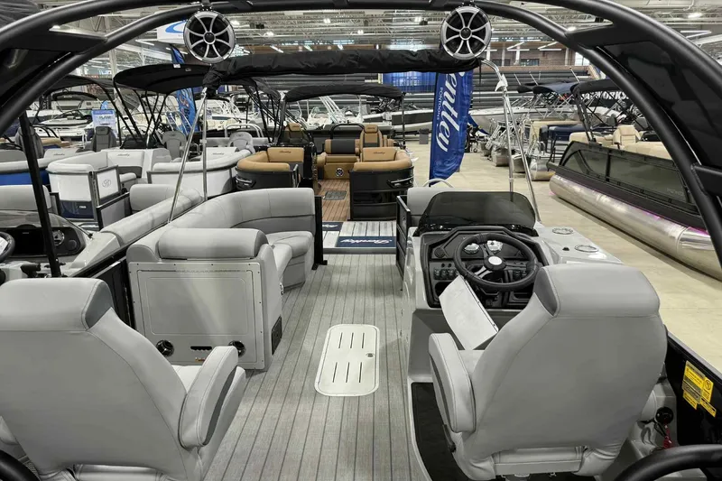 Slide: The Image of 2026 Bentley Pontoons Legacy 243 Swingback Dual Captain, luxury interior, boat show display. - 20