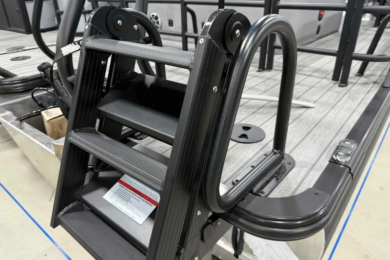 Slide: The Image of 2026 Bentley Pontoons Legacy 243 Swingback ladder detail on deck. - 4