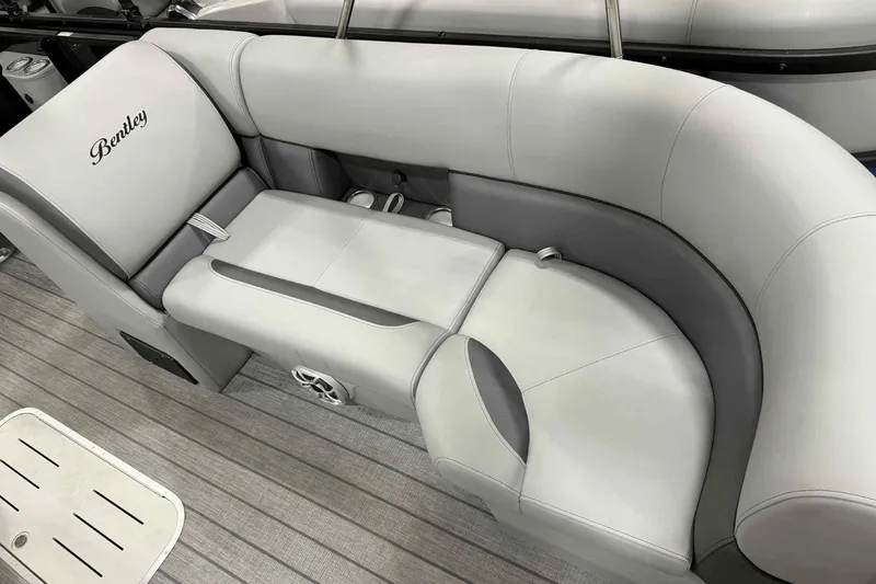 Slide: The Image of 2026 Bentley Pontoons Legacy 243 Swingback interior with plush seating and elegant design. - 7