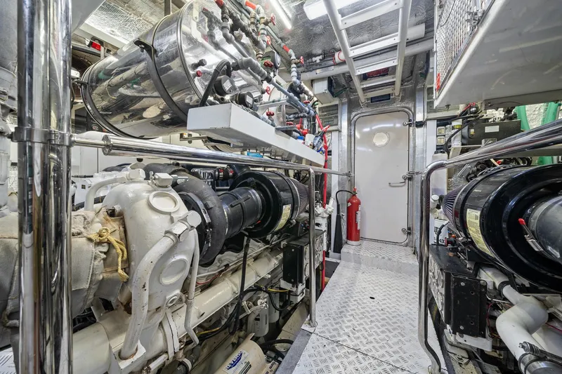 Slide: The Image of Engine room of 2008 Sunseeker 90 Yacht, featuring complex machinery and equipment. - 108