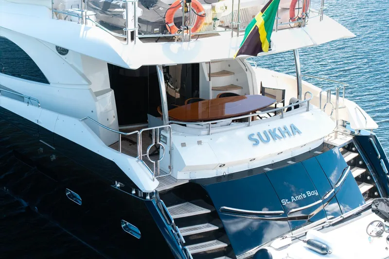 Slide: The Image of Sunseeker 90 Yacht 2008, named Sukha, docked with elegant design and spacious deck. - 19