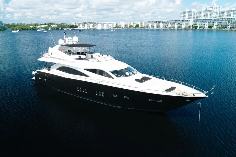 Slide: The Image of 2008 Sunseeker 90 Yacht on calm water, modern design, luxury vessel. - 3