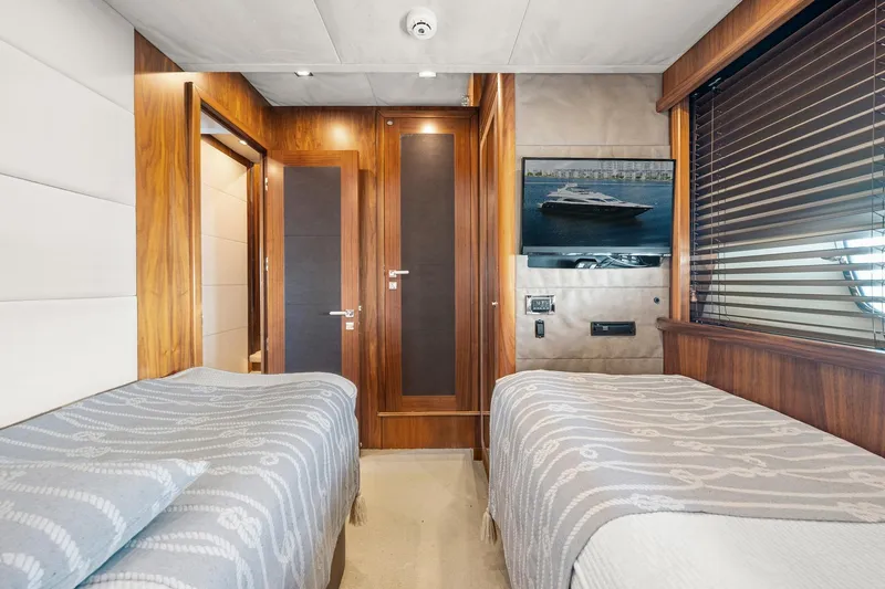 Slide: The Image of Luxurious twin bedroom on 2008 Sunseeker 90 Yacht with elegant wood finishes. - 31