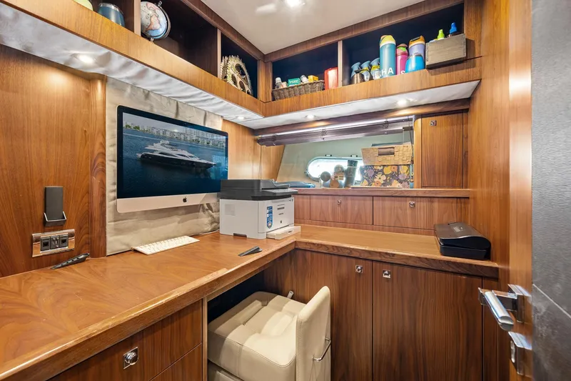 Slide: The Image of Luxurious office space on 2008 Sunseeker 90 Yacht with wood finish and modern amenities. - 32