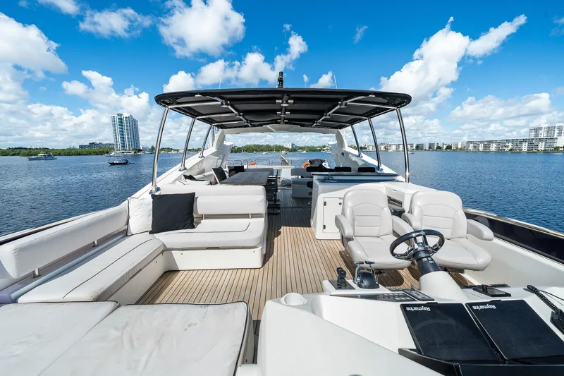 Slide: The Image of Luxurious 2008 Sunseeker 90 Yacht with spacious deck and scenic waterfront view. - 34