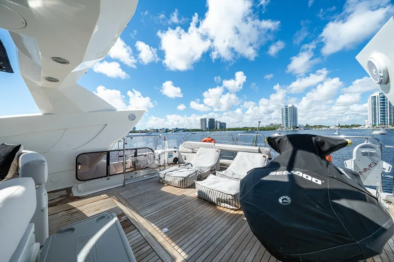 Slide: The Image of Luxurious 2008 Sunseeker 90 Yacht deck with scenic waterfront view. - 43