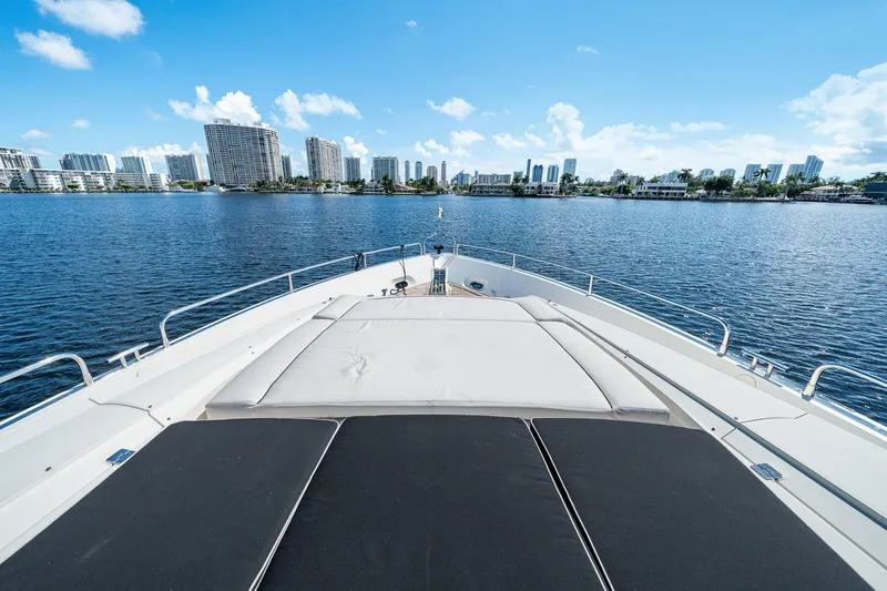 Slide: The Image of Sunseeker 90 Yacht 2008 cruising with city skyline in the background. - 45